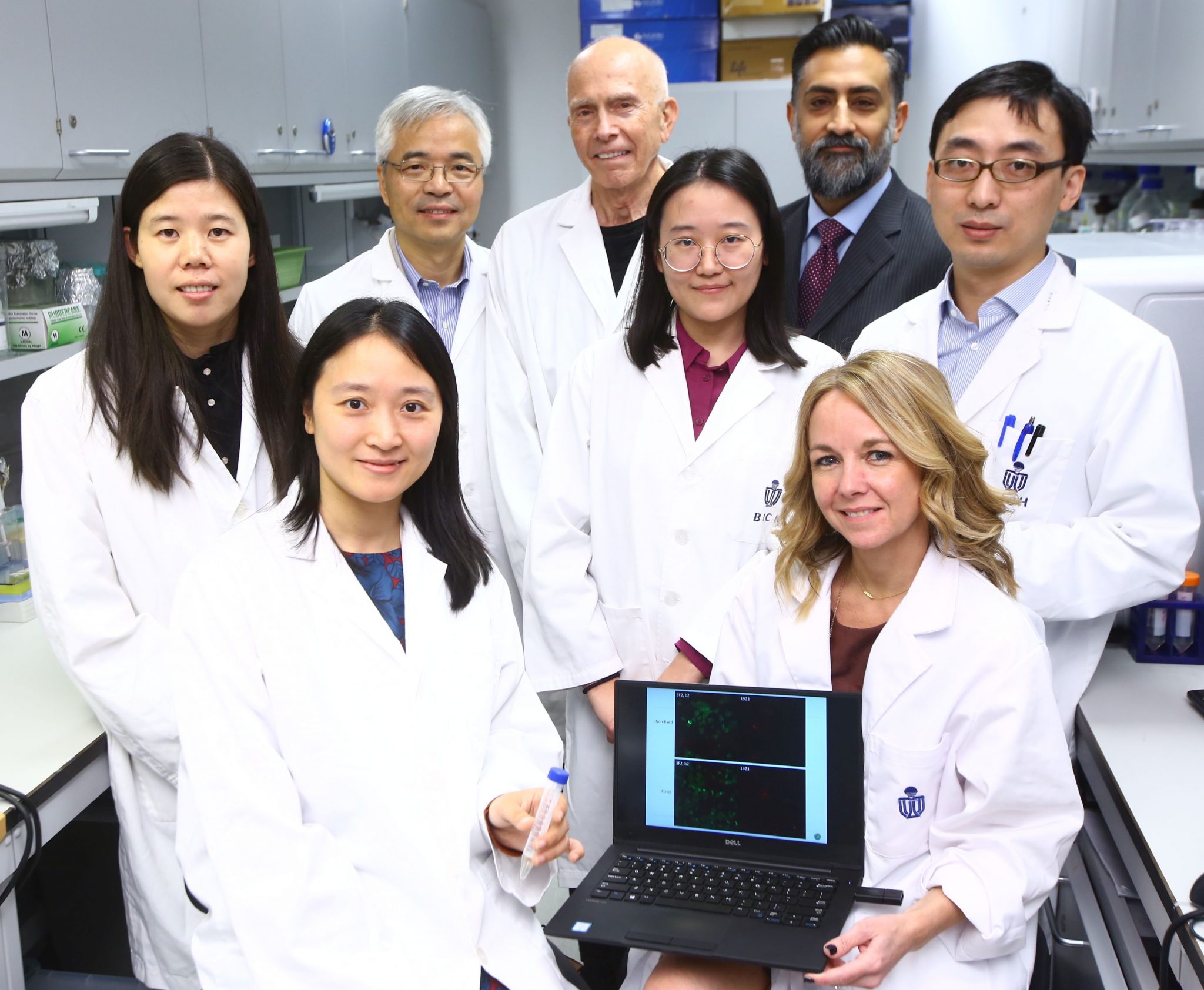 A group photo of Prof. ZHANG Mingjie (back first left), Prof. Paul SCHIMMEL (back middle) and Dr. Sanjay SHUKLA (back first right) with members from the HKUST/Pangu research team.