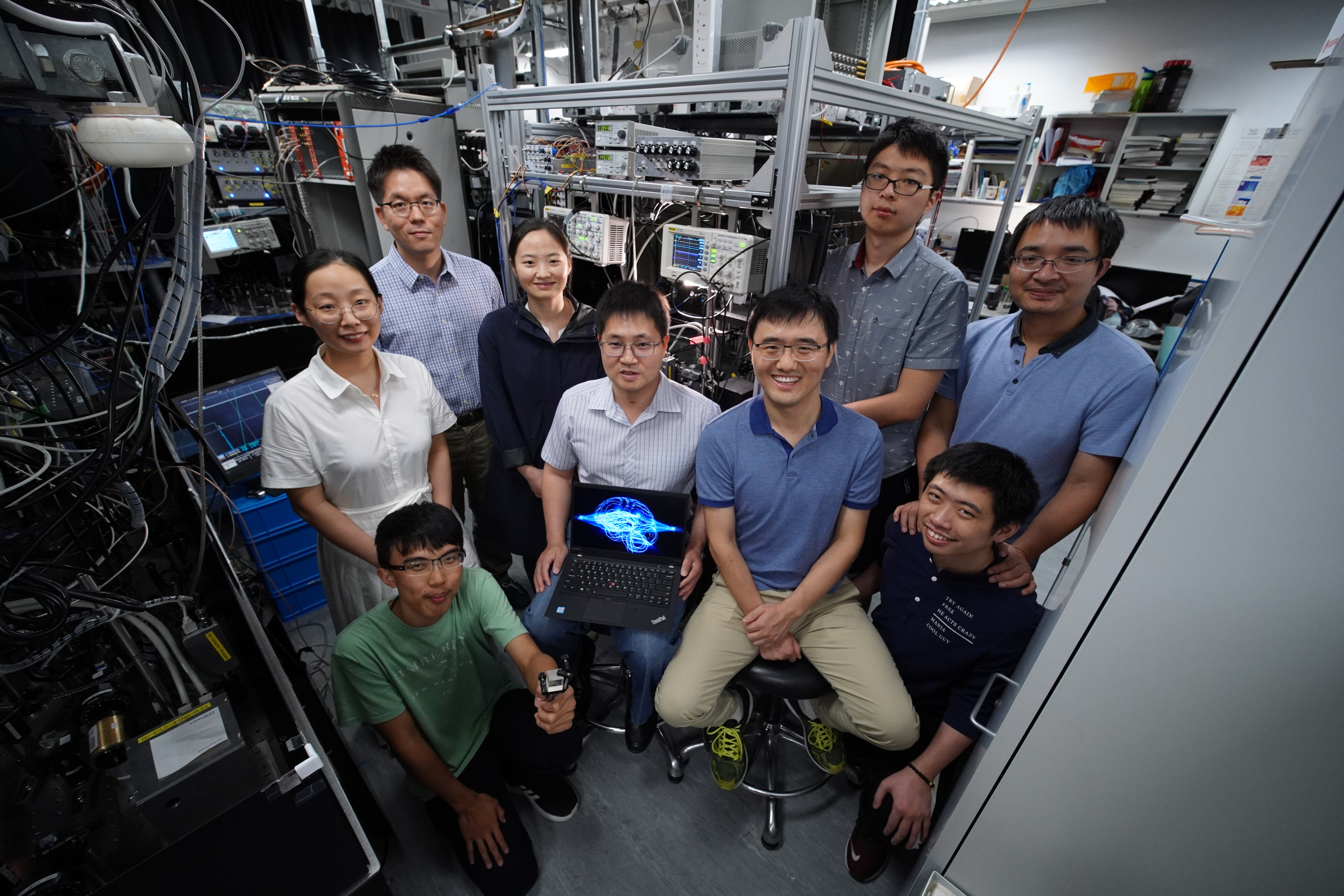 Prof. DU Shengwang (middle left, seated), Prof. LIU Junwei (middle right, seated), Prof. JO Gyu-Boong (back left, standing) and their research team 