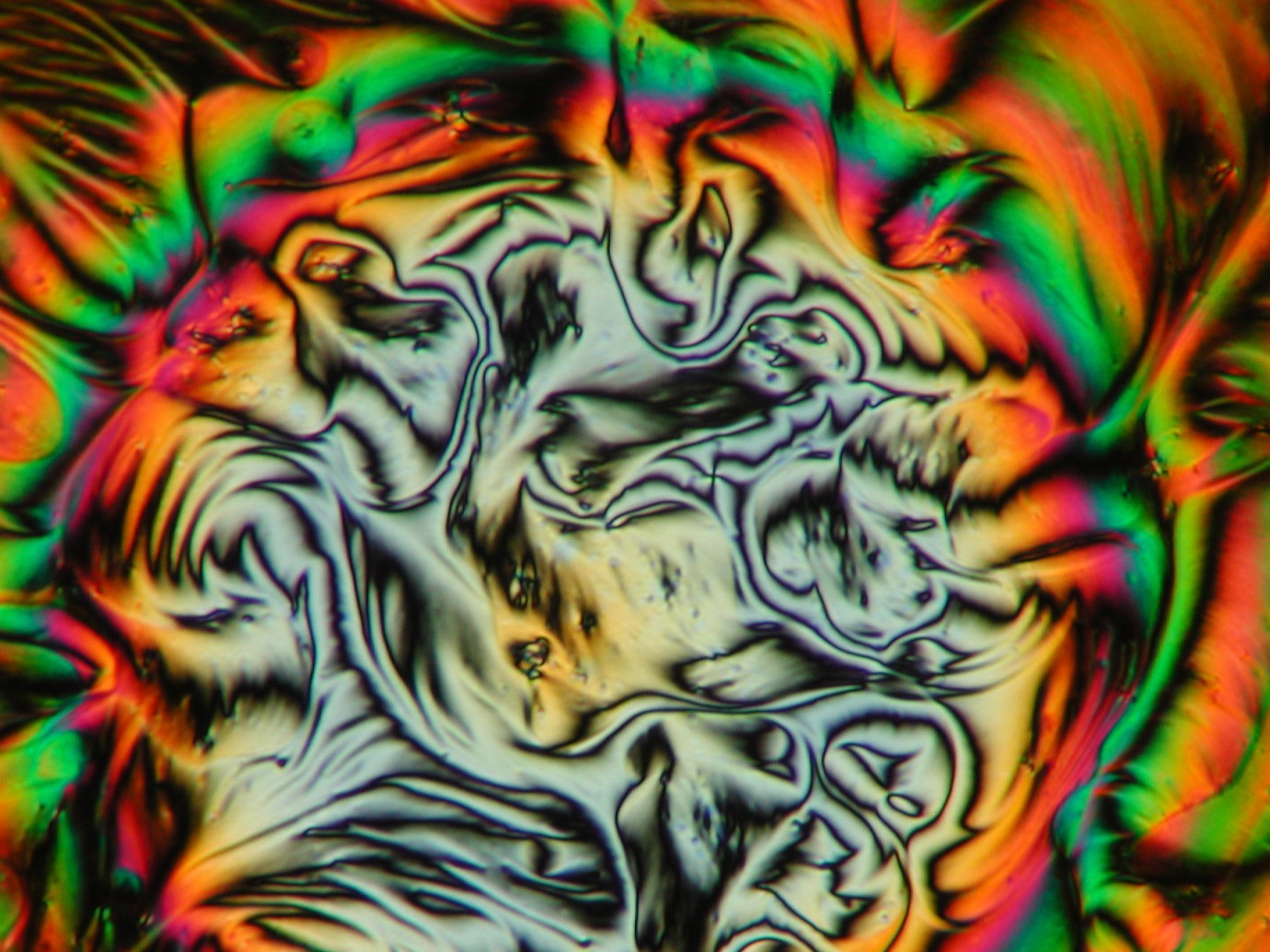 Image of liquid crystals courtesy of Wikimedia Commons